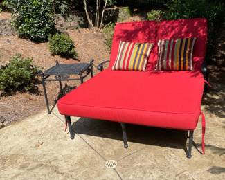 red poolside lounger, iron side table