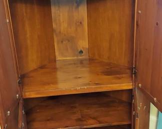 Interior of pine corner cabinet