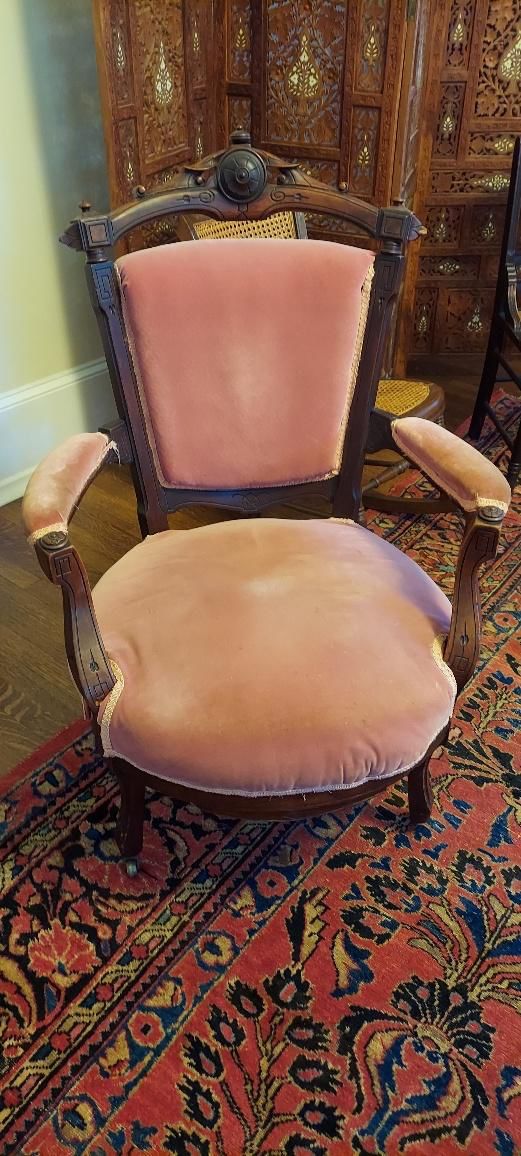 Antique upholstered arm chair