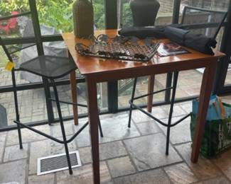 Versatile pub table or puzzle table.  Three metal stools available