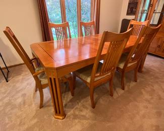 Dining room table with 6 chairs (shown with leaf in table) Matching china cabinet - photo to follow