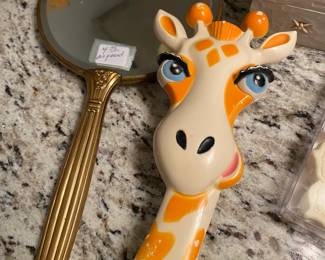Bath items including an adorable Giraffe Brush