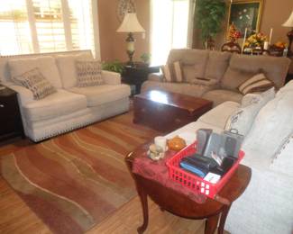 Two identical sofa's and a dual electric recliner Priced to sell
