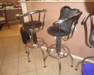 Three unique bar stools, swivel and bounce