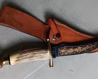 Case fixed blade knife, 10 3/4 length, horn handle
Rust spot visible in photo