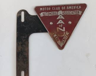 Original Old License Plate Topper 
embossed metal topper with side mount bracket
Some rust noted
