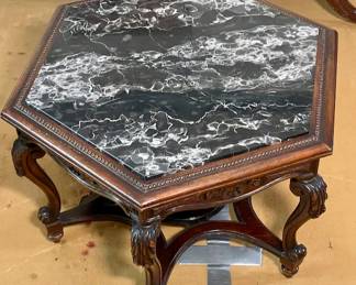 Carved small marble top table. 