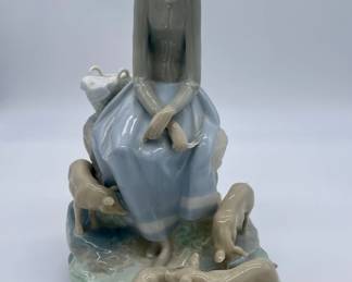 Lladro "Girl with Pigs".  Early impression mark.