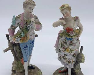Pair of Capodimonte style figurines.