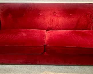 Red velvet sofa.