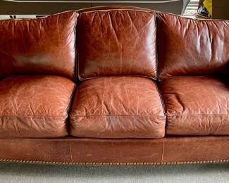 Thomasville brown leather sofa with nailheads.