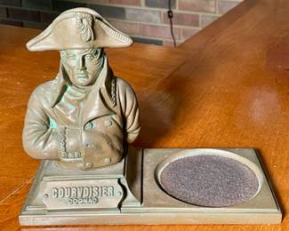 Courvoisier cognac Napoleon bottle display.