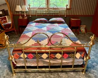 Queen brass bed.