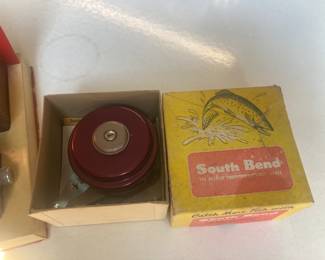 Automatic fly rod reel with box