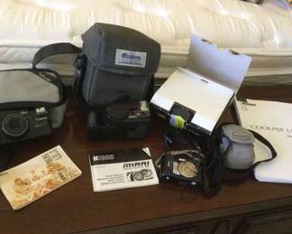 Cannon..Ricoh And NIKON