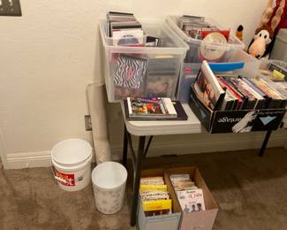 Fill a bag$5.  Two rooms dedicated to this-includes CDs, dvds, Office supplies, personal care, plastic containers, small bins and decor pieces, frames, holiday, cleaning supplies, towels, single bedding pieces, and random garage things.  We realize that some things might not fit in a bag-such as a broom-but hopefully you get the idea!