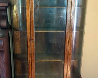 Vintage 5 Shelf Wood Locking Curio Cabinet On Casters With Curved Glass, And Key, 66" x 37.25" x 14"