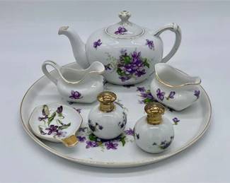 Lot 033   1 Bid(s)
Porcelain Tea Set with Tray