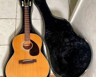 Lot 051   12 Bid(s)
Yamaha FG-75 Acoustic Folk Guitar