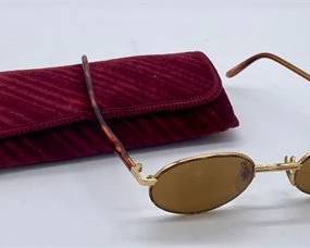 Lot 191   9 Bid(s)
Vintage Round Rimmed Ray-Ban Sunglasses