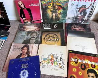 Vintage vinyl LP record albums. Jesus Christ Superstar, Bruce Springsteen, Simon and Garfunkel, Jackson, Browne, Tom Petty, Molly Hatchet, Albert Hammond, the rock album: Styx, Kansas, Boston , and ELO, Crosby, Stills, Nash and Young, Elvis, James Taylor, Billy Joel, Burton Cummings, and Foreigner. 

