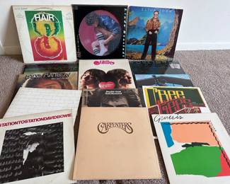 Vintage vinyl record  LPs  album:  Fleetwood Mac, Barry Manilow, Pink Floyd, David Bowie, Carpenters, Neil Diamond, Double Gold, Heart, Linda Ronstadt, Elton John, foreigner, Billy Joel, the Bee Gees, and Genesis.