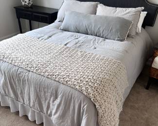 Full size mattress set with grey upholstered headboard