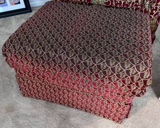 Red upholstered ottoman
