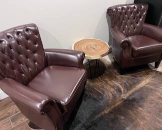 Faux leather armchairs