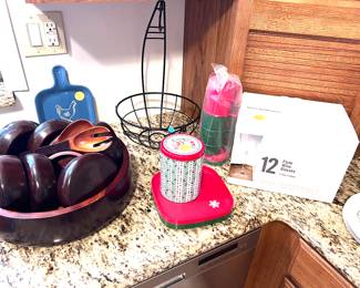 Wooden salad bowl set. Tupperware plates (4) with cups and lids (4) (never used). Wine glasses unused. Fruit bowl/banana hanger. 