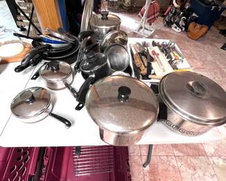 Revereware pots and pans. Silverware. 