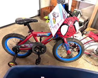 Spiderman bike with helmet and training wheels. 