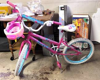 Girl's bike with helmet.  