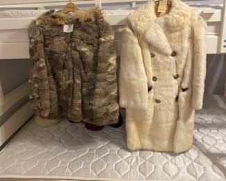 Women's rabbit coats. Needs repair on both at the shoulders. 