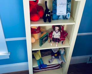 Small narrow shelf with home decor 