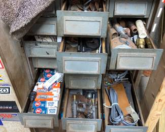 1 of many sets of drawers full of car repair items 