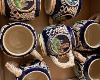 German mugs inscribed with various German cities.