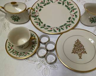 Lenox holiday China. 4 dinner plates, 4 salad dishes, 4 cups/saucers, 4 napkin holders. 1 creamer and 1 sugar bowl.
