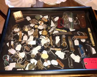 Loads of pocketknives and costume jewelry (unless some of Queen Elizabeth's slipped in without our knowing it...)