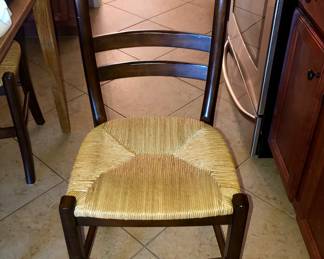 One of four rush seat side chairs