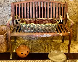 Vintage iron bench with many seasonal decorations