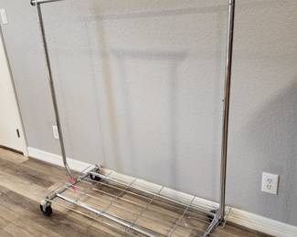 Commercial Grade Rolling Chrome Clothes Rack - in Apartment 