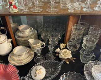 Additional photos of decorative glassware including tea cups, cream and sugar set, and goblets