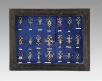 Framed Lot of Twenty-One (21) Different Agadez Cross of Niger Tuareg Silver Pendant

