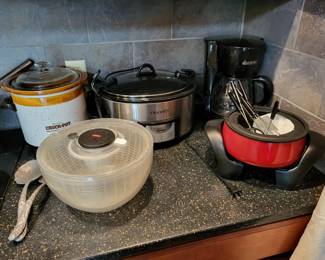 Crock pots, coffee maker, salad spinner, fondue pot