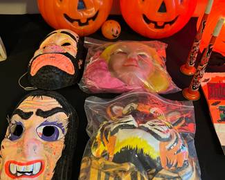 Exxon Lion costume 
Cinderella costume 
Witch mask 