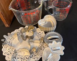 Hand cookie cutter 
Glass Pyrex measure cups 