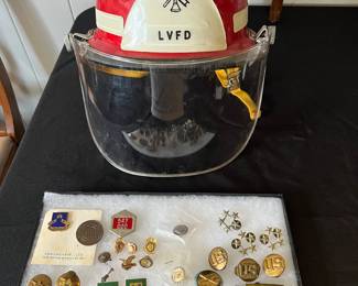 Army pins 
John Toms Livingston Fire department Helmet 
