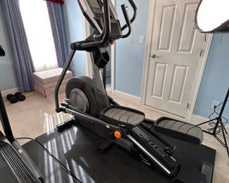 Epic A35E elliptical machine, works well, has two hand sensors without covers, video screen and iPod compatible  5'10"L x 24"W, comes with thick stabilizing floor mat