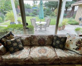 1960's sofa with Asian tapestry upholstery. Good condition.